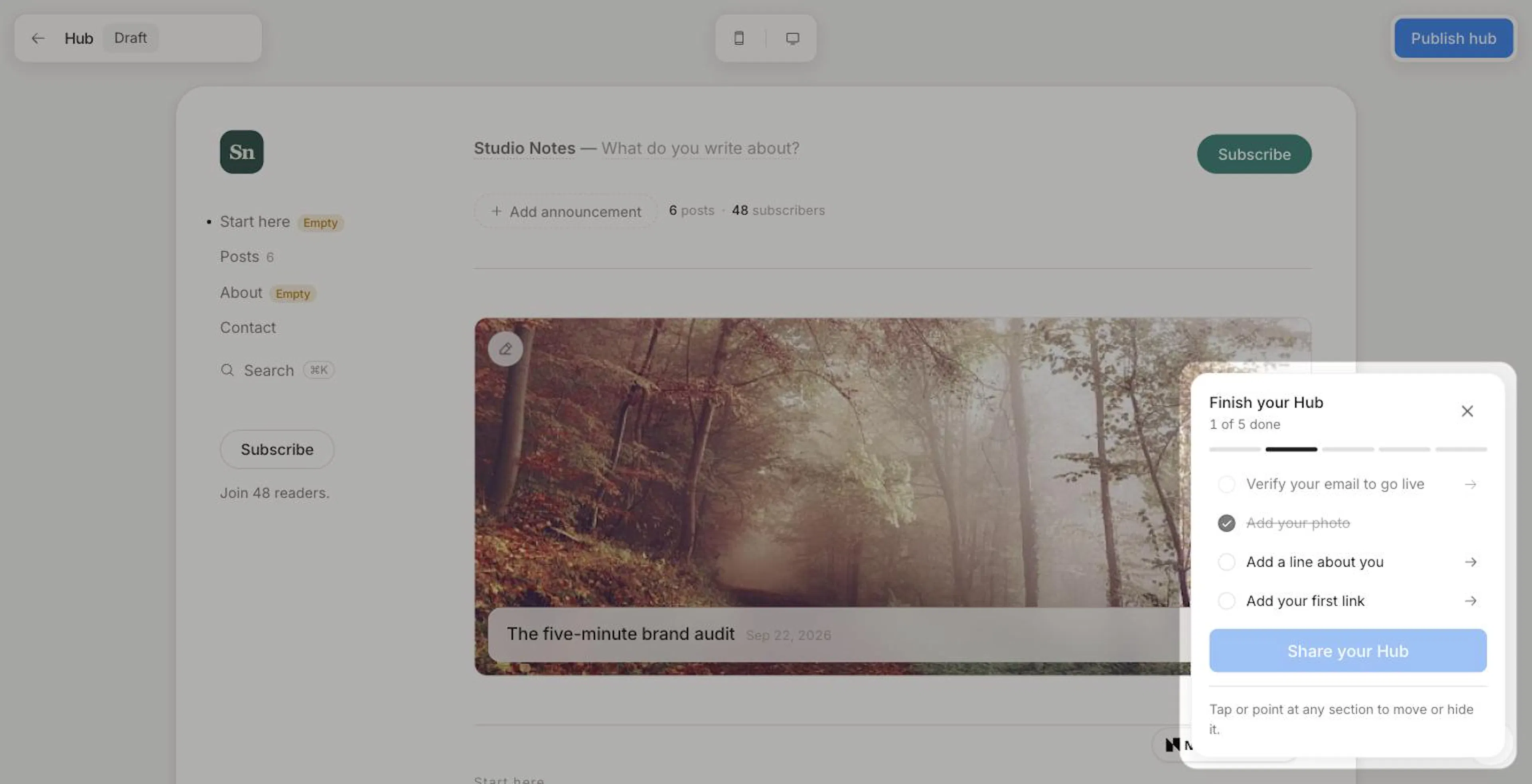 The Hub editor on a first visit, dimmed around the Finish your Hub checklist